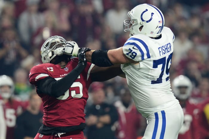 Dec 25, 2021; Glendale, Arizona, USA; Indianapolis Colts offensive tackle Eric Fisher (79) blocks Arizona Cardinals outside linebacker Chandler Jones (55) during the first half at State Farm Stadium. Mandatory Credit: Joe Camporeale-USA TODAY Sports